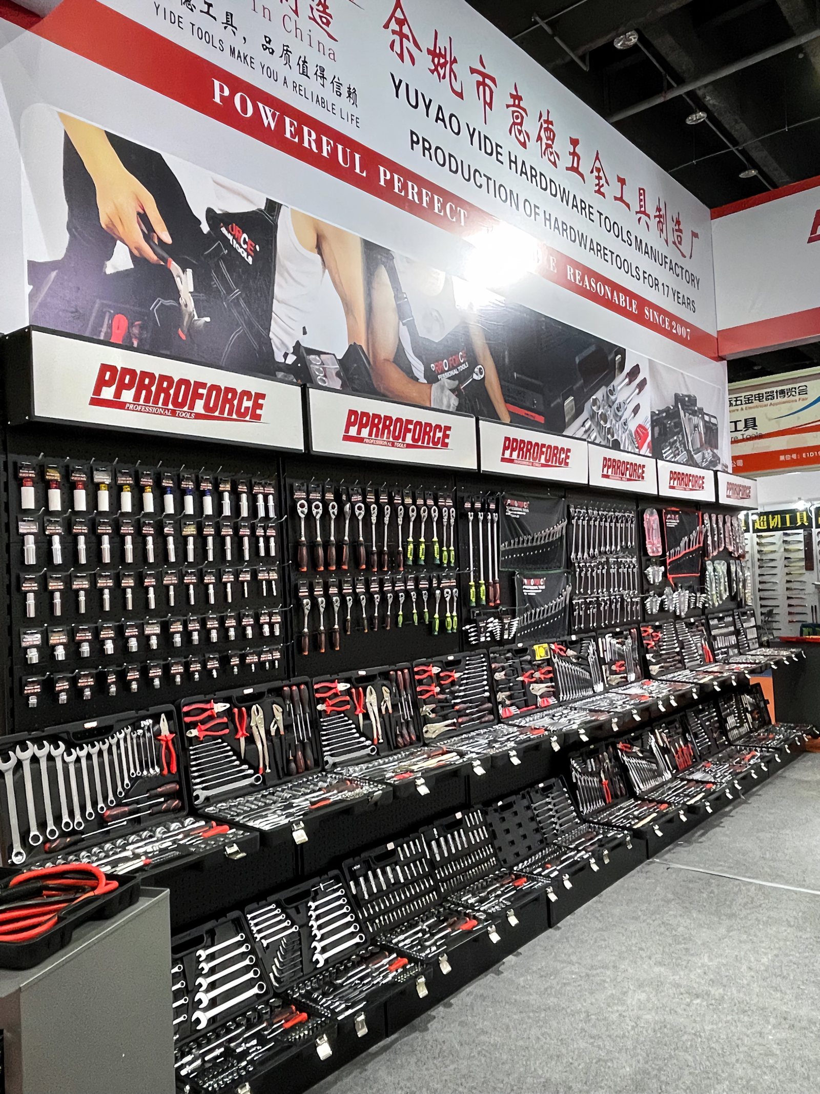 PPRROFORCE stand with branded racking at a trade show