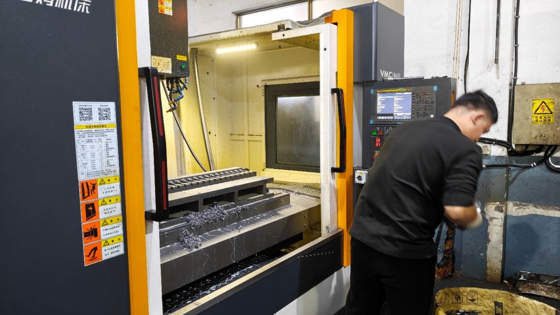 Vertical machining centre in operation